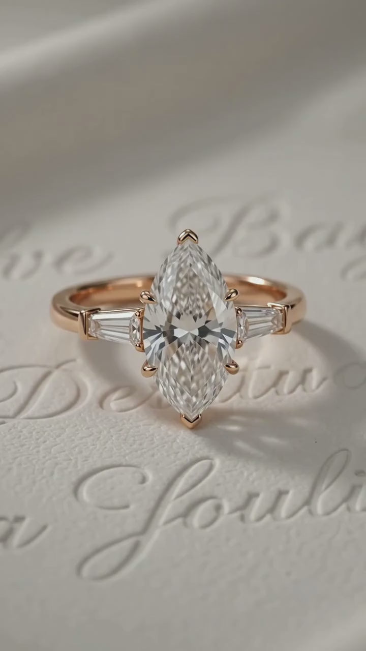 Marquise Cut Diamond Engagement Ring with Tapered Baguette Side Stones in Gold